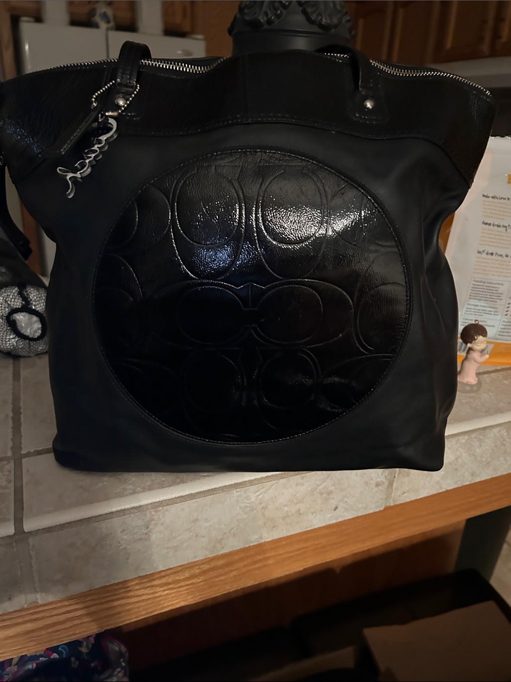 Coach Black Leather Embossed Circle Tote With Matching Wallet And Coin Purse.